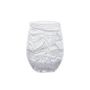 Like swirling water and the decorative pages of Florentine leather-bound books, this marbled wine glass adds an eclectic splash to your everyday table with its captivating motif in soft sea glass hues of white, blue, and green for a joyful pop of color. These chic vessels add a super stylish layer to cocktail hour and place settings - the abstract pattern mixes beautifully with everything.