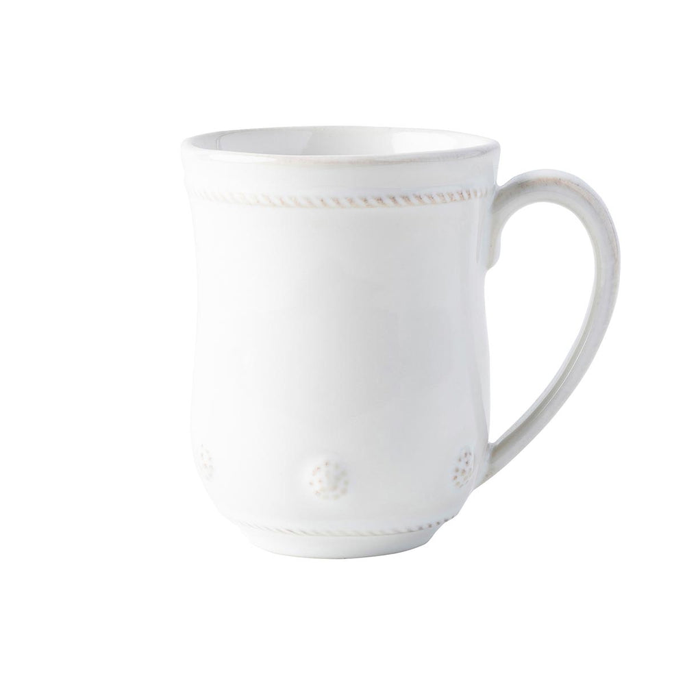 This mug is rimmed with a simple thread and adorned with a sprinkling of berries.
