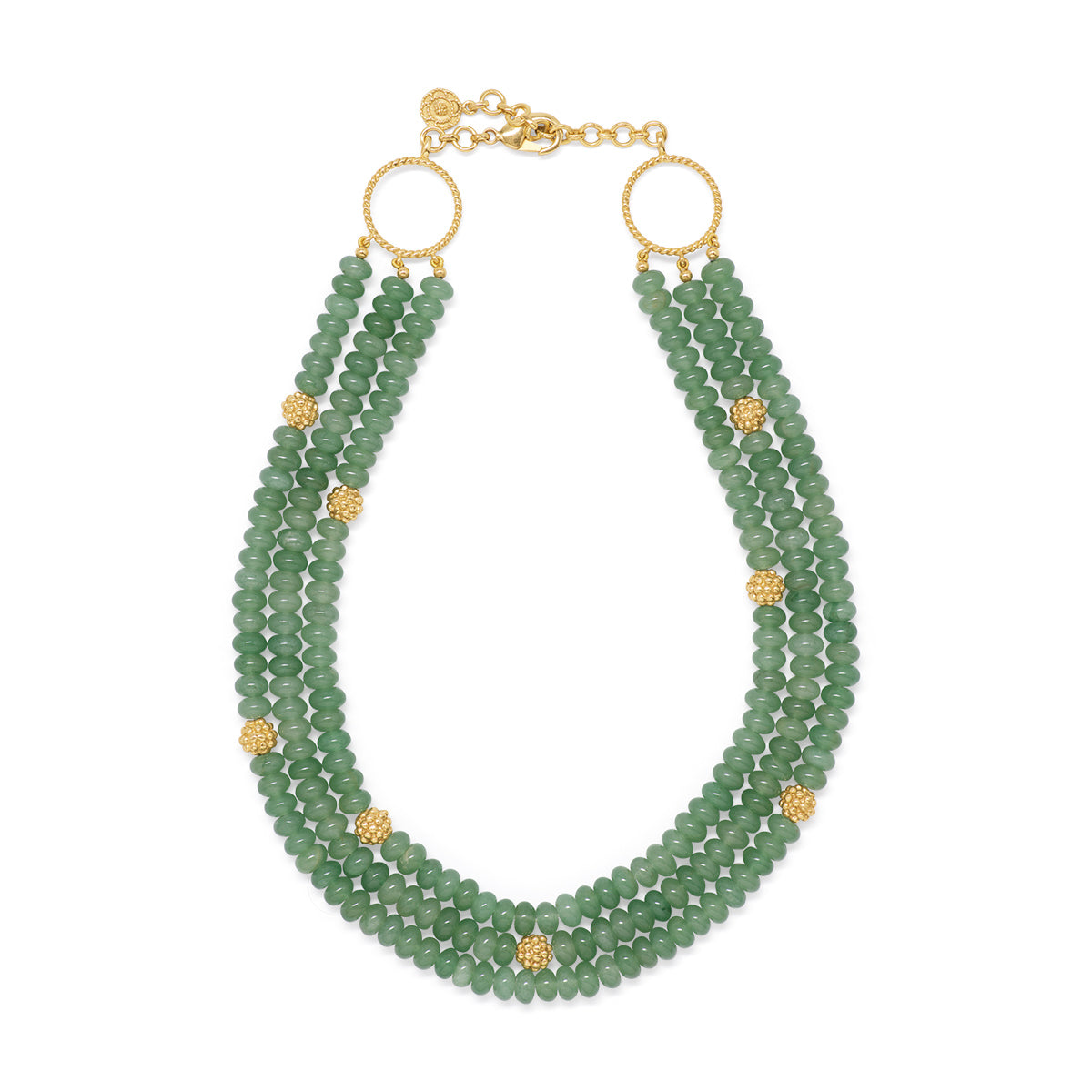 Triple strand necklace of meadow-green jade.