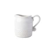 From our Le Panier Collection - Our basket weave motif lends a note of rustic refinement to this petite pitcher that may inspire thoughts of idyllic country hamlets and the bounty they afford, namely fresh cream, homemade jam, and baked goodies straight from the oven.