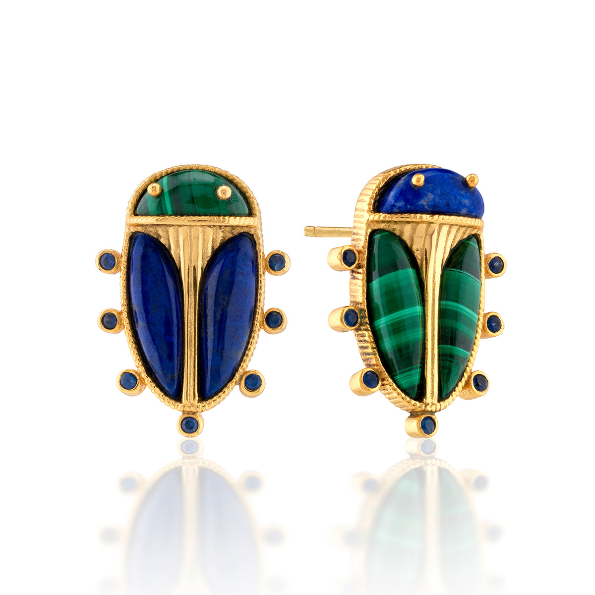 This pair of perfectly mismatched scarab stud earrings are an empowering talisman of strength and resilience to carry with you every day. Our version of an ancient Egyptian amulet, these colorful characters feature intricate golden detailing and alternating heads and wings in polished lapis and malachite.