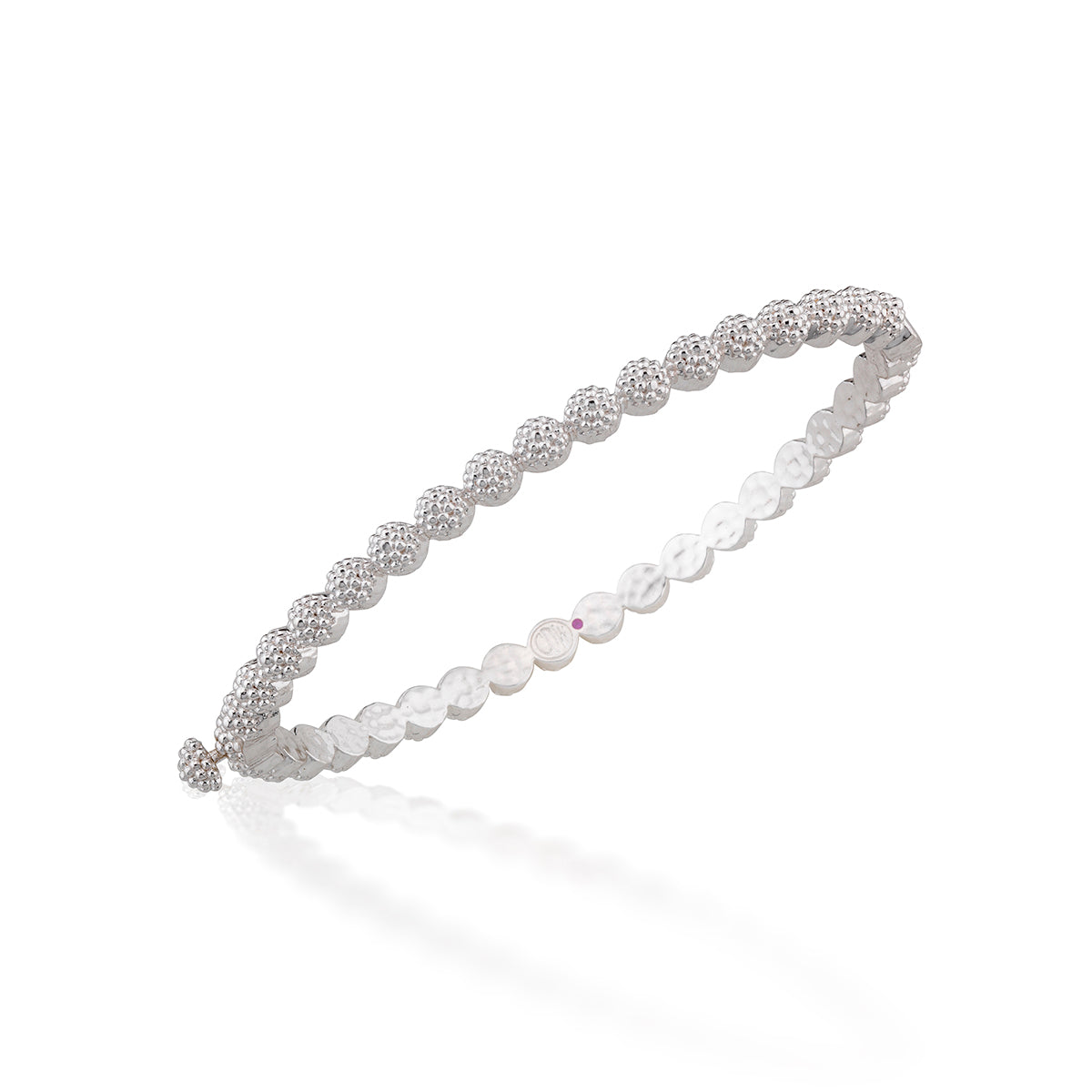 A silver-toned beaded stretch bracelet featuring textured round beads and a single central faceted clear crystal bead, displayed on a clean white background with a soft reflection.