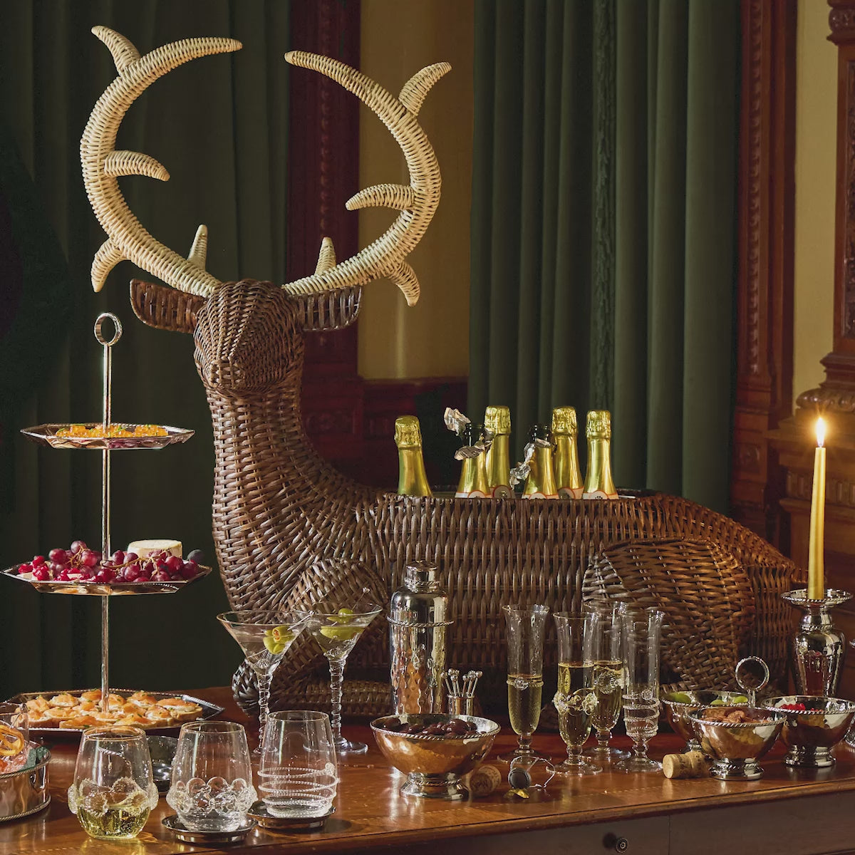 Load video: Moving gif featuring cocktail glasses, barware, and people cheering with cocktail glasses 