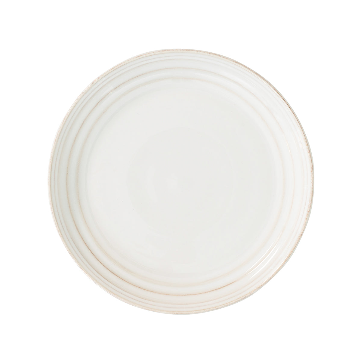 From our Bilbao Collection - A beautiful complement to any table setting, this versatile plate pairs potter's wheel detailing with modern shaping to beautifully showcase everything from fresh summer salads to cozy fireside confections. 