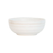 From our Bilbao Collection - The hand-hewn texture and warm whitewash glaze of this classic bowl pairs perfectly with everything from decadent mint chip ice cream at midnight to soul-warming slow-cooked oats at sunrise. 
