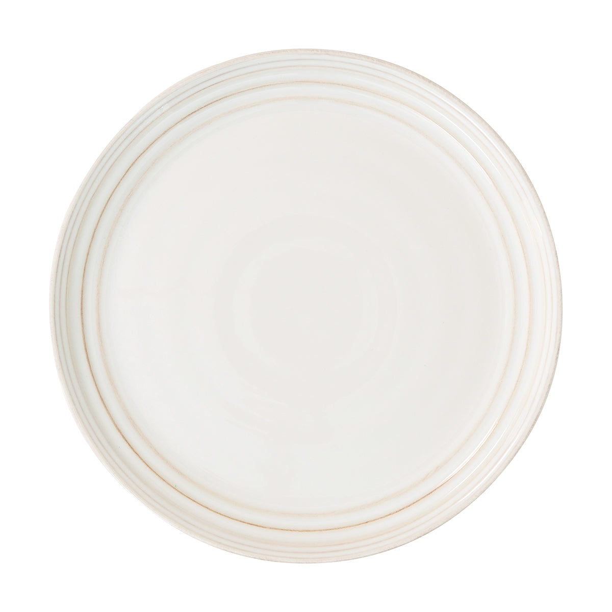 From our Bilbao Collection - Hand-hewn in a classic coupe shape and finished with our warm and translucent signature whitewash glaze, this dinner plate will elevate any casual gathering with a stunning combination of modernity and patina. 
