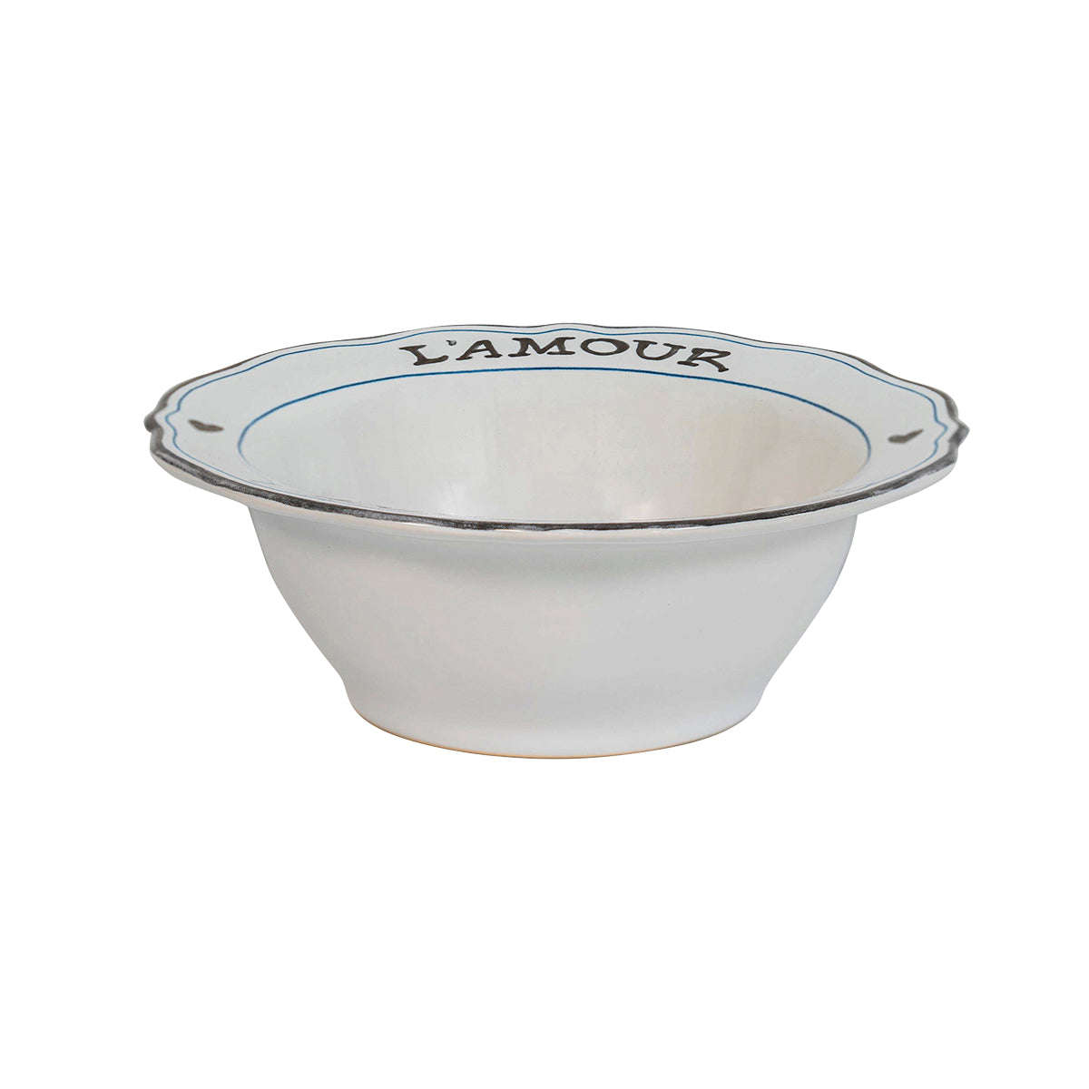 Just like Paris, it’s easy to fall in love with this bowl that is trimmed in chic black and blue, and edged with a romantic scallop. Featuring our hand sketched L’amour Toujours motif and a pair of petite hearts, fill it with sweet things like cherries or beignets and devour the contents to discover our Berry & Thread hot air balloon floating within the basin.  