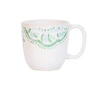 The beguiling pattern of this cofftea cup was inspired by the intricately painted tiles we found on an escapade to the Iberian Coast. Featuring a verdant palette of soft sage and sky-blue hues that are both refreshing and soothing - you will want to use this gorgeous green mug for a fresh start in the morning with coffee or tea or filled with decadent hot chocolate on a cozy afternoon. 