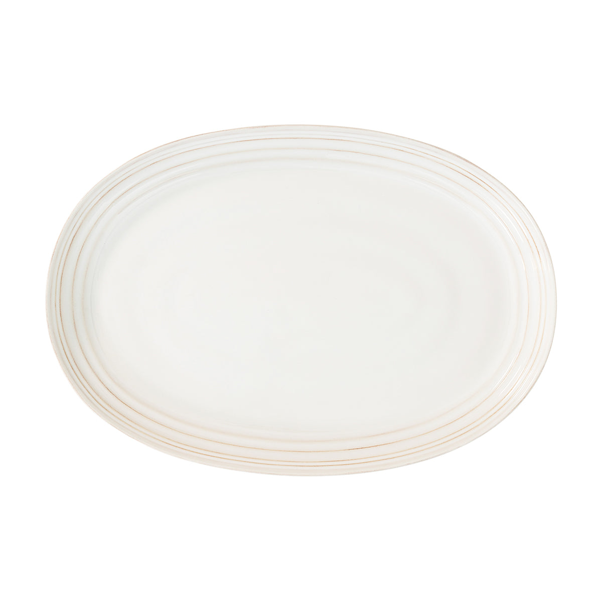 From our Bilbao Collection - Positively everything looks beautiful when served atop this generous hand-hewn platter, with its lustrous whitewash glaze that mixes and matches with any tablescape and occasion. Sophisticated and subtle, it works for everything from casual brunch to a formal dinner party. 