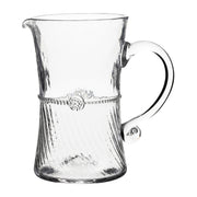 Glass bar pitcher with optic glass halfway up and then clear to the rim.