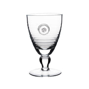 From our Berry & Thread Collection- Raise your glass in cheer! Our footed goblet sets the stage for your exquisite celebration. Adorned with a sweet berry and thread medallion our goblet stylishly blends elegance and function.