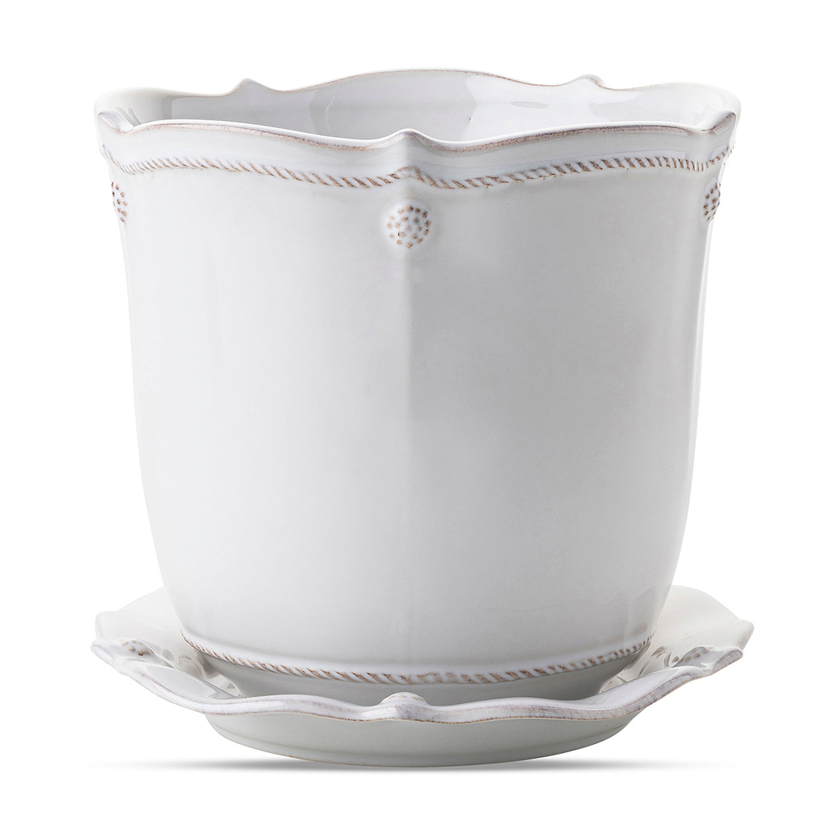 Beautifully display plants in your home with our new Berry & Thread ceramic planters. Designed with function in mind, they have a small hole at the bottom for drainage and come with a corresponding saucer. This 7" size hosts medium plants such as orchids, tulips, ferns, succulents and look darling when clustered in a grouping.