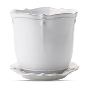 Beautifully display plants in your home with our new Berry & Thread ceramic planters. Designed with function in mind, they have a small hole at the bottom for drainage and come with a corresponding saucer. This 7" size hosts medium plants such as orchids, tulips, ferns, succulents and look darling when clustered in a grouping.