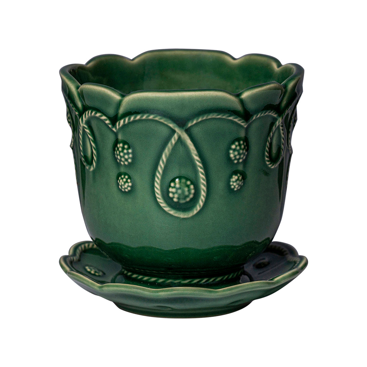 Subtly detailed in our romantic Gardens of the World motif in an exclusive green glaze, this pretty 5.5 inch pot is designed with drainage so that whatever flights of flora fancy you desire can thrive beautifully in your home. We adore ours filled with orchids on the desktop, dainty chamomile flowers in the kitchen window for fresh tea or as a thoughtful gift for a hostess or friend.