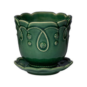 Subtly detailed in our romantic Gardens of the World motif in an exclusive green glaze, this pretty 5.5 inch pot is designed with drainage so that whatever flights of flora fancy you desire can thrive beautifully in your home. We adore ours filled with orchids on the desktop, dainty chamomile flowers in the kitchen window for fresh tea or as a thoughtful gift for a hostess or friend.