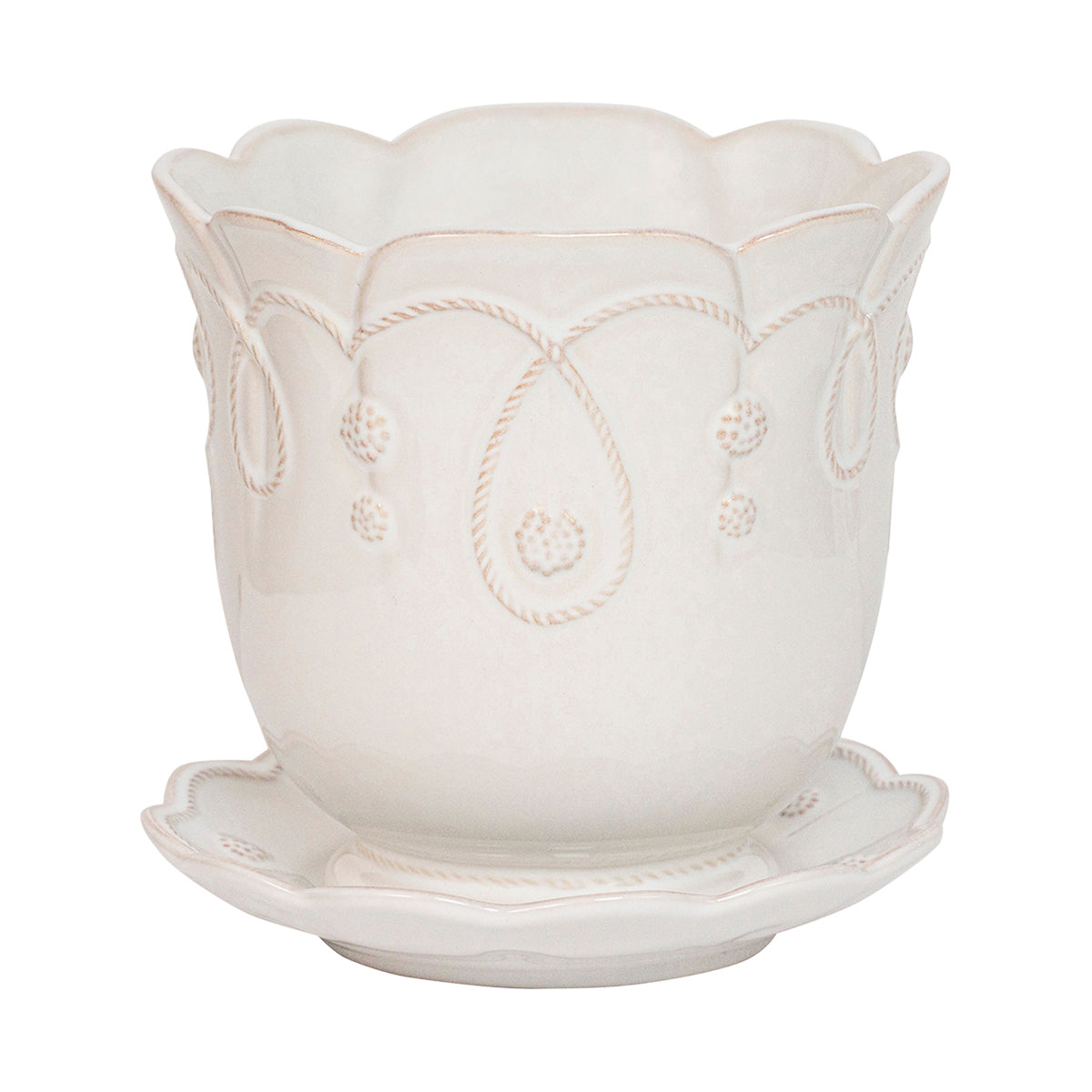Subtly detailed in our romantic Gardens of the World motif, this pretty pot is designed with drainage so that whatever flights of floral fancy you desire can thrive beautifully in your home. We adore ours filled with orchids on the desktop, dainty chamomile flowers in the kitchen window for fresh tea, or as a thoughtful gift.