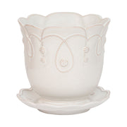 Subtly detailed in our romantic Gardens of the World motif, this pretty pot is designed with drainage so that whatever flights of floral fancy you desire can thrive beautifully in your home. We adore ours filled with orchids on the desktop, dainty chamomile flowers in the kitchen window for fresh tea, or as a thoughtful gift.