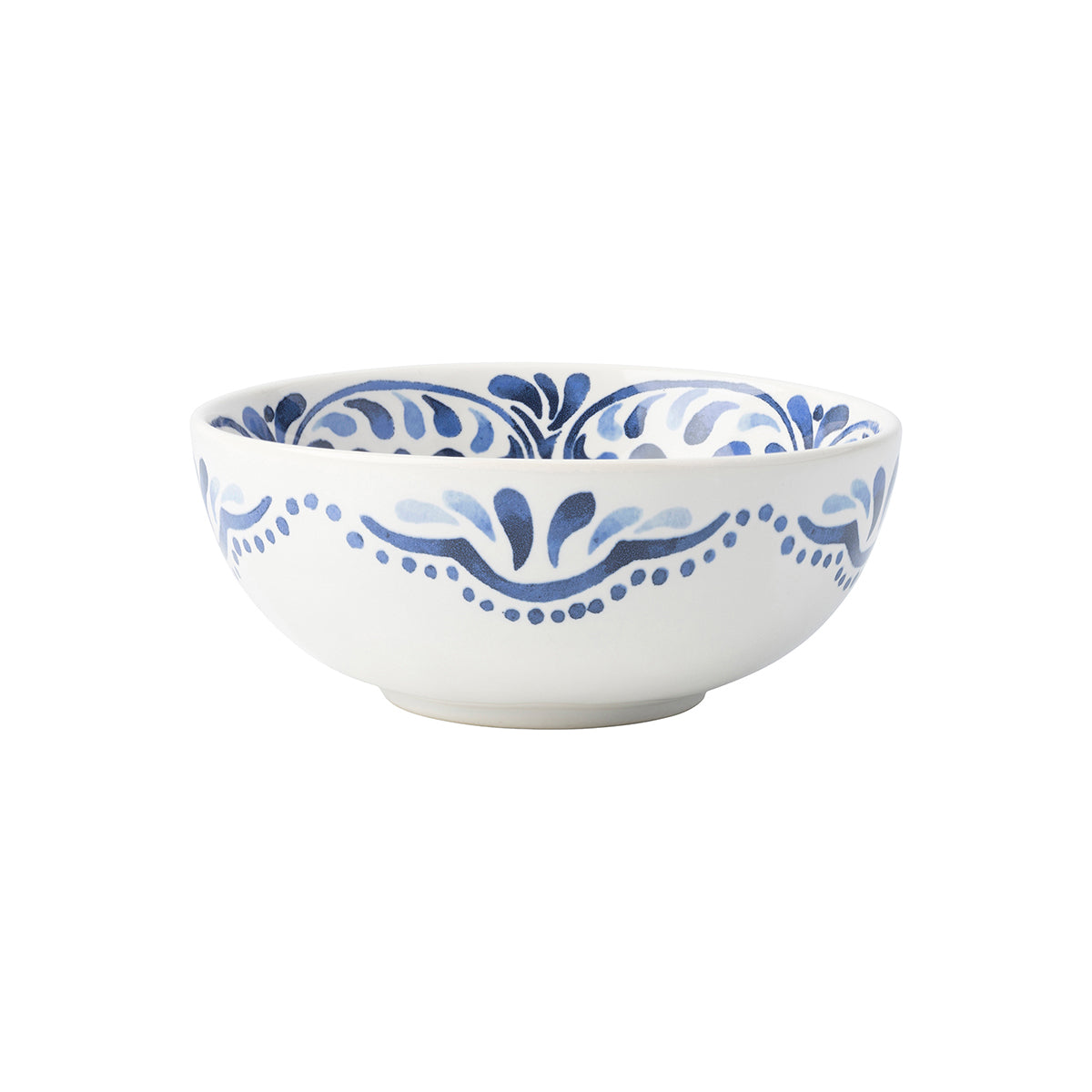 White and blue bowl with a design inspired by Iberian tiles.