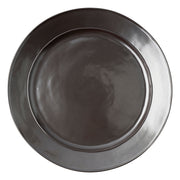 From our Pewter Stoneware Collection - Uniting past romance with cool modernism, the lustrous pewter hue and finish of this large charger looks like it is bathed in perpetual candlelight. Build your table setting or serve appetizers with this uniquely shaped foundation piece that is equally at home in a dazzling Manhattan duplex or stone cottage.