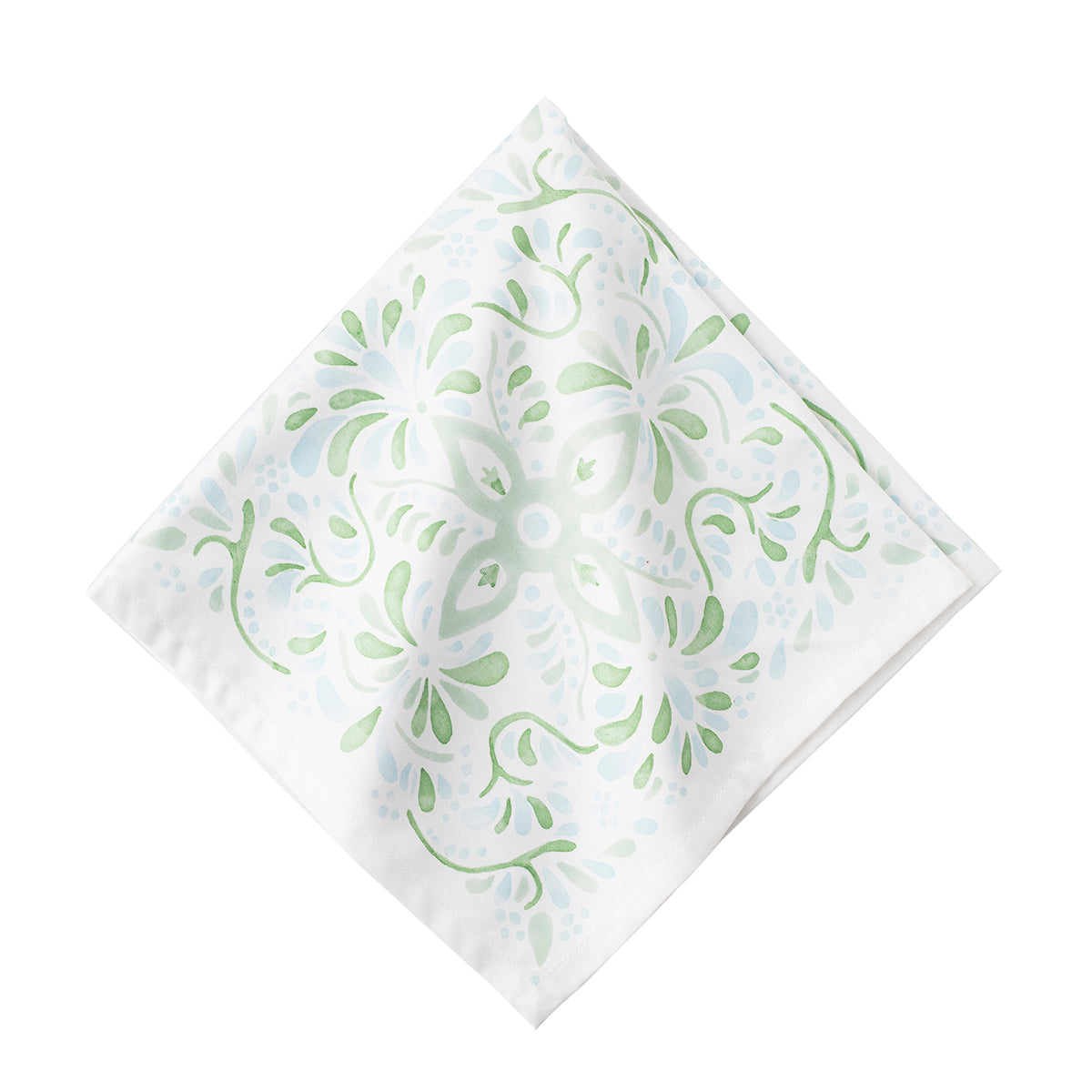 Inspired by the intricately painted tiles we found on an escapade to the Iberian Coast and featuring a palette of soft sage and sky-blue hues, this napkin will be a welcome addition to any tablescape.