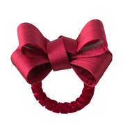 Everyday is worthy of fanciful celebration! Our pretty and versatile ruby tuxedo napkin ring adds a touch of flare to any setting from a casual brunch for two to a formal holiday gathering. Slip our bow over your favorite linen and, voila! Instant elegance!