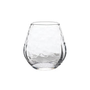 This subtly shimmering and stemless wine glass is crafted of sturdy mouth-blown glass to celebrate life's simple pleasures every day.