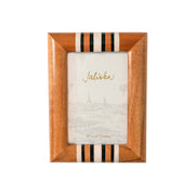 Warm and welcoming hand-turned acacia wood is accented with chic black and white stripes of hand-applied resin - making these handsome frames a naturally beautiful way to display your most treasured moments. 