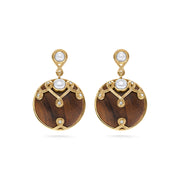 These alluring earrings are a paradoxical pairing of lustrous pearls and hand-carved teak wood accented with tiny crystals. These are stunning when paired with our Elizabetta Pearl Necklace or any of our other teak wood necklaces.  