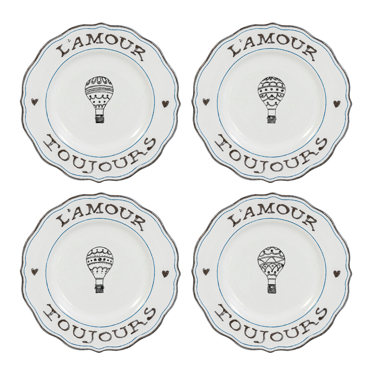 Four salad plates with the L'Amour Toujours balloon design painted on them.