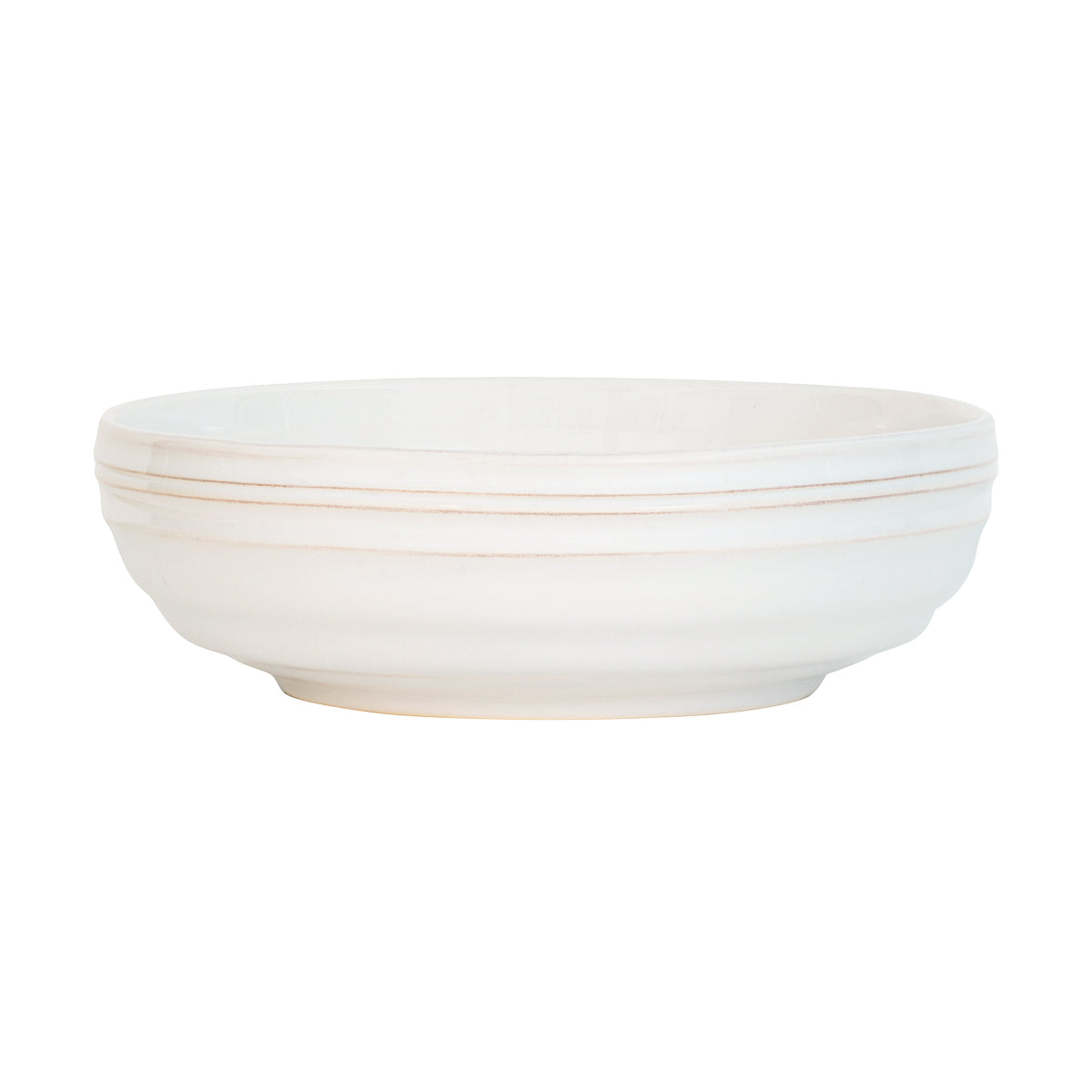 From our Bilbao Collection - A tour-de-force in modern tableware, this coupe bowl is translated beautifully in cozy curves and a well-loved patina. Serve up sumptuous amounts of your favorite grain bowl, fresh pasta, or slow cooked stew. 